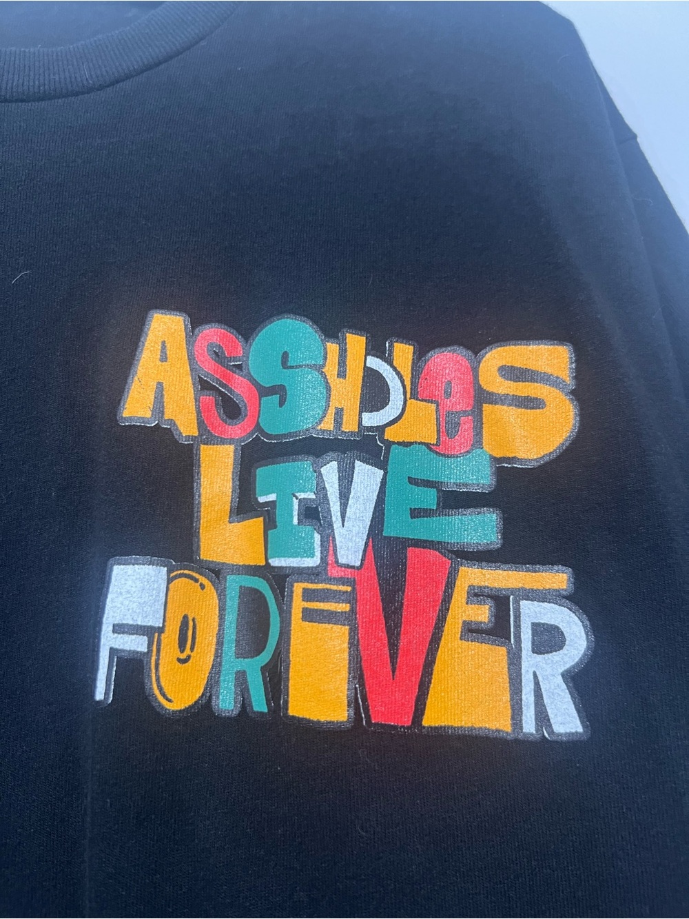 Assholes Live Forever black graphic tee
